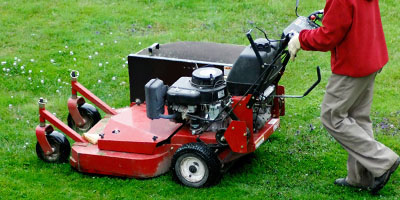 Person Using a Lawnmower